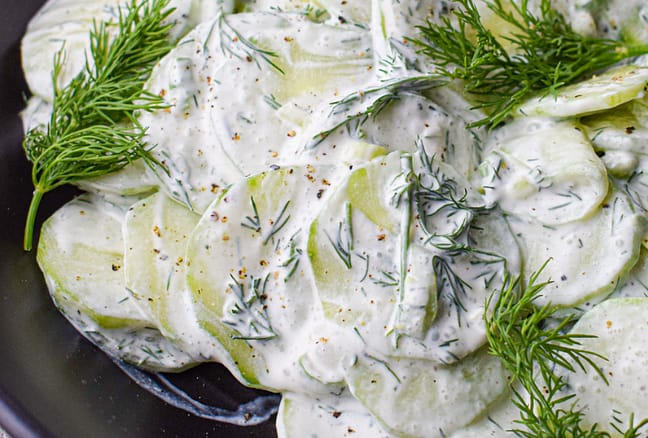 Polish Cucumber Salad Mizeria with fresh dill and creamy dressing Polish Cucumber Salad Mizeria with fresh dill and creamy dressing